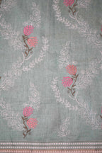 Pista Green Silk‑blend Saree.